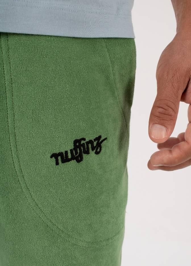 STONE GREEN TOWEL SHORTS closeup - nuffinz logo - men's shorts with front pockets