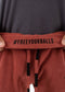 TANDOORI SPICE TOWEL SHORTS closeup - freeyourballs stitch - men's shorts with branded waistband stitch